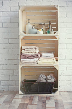 Repainted Wooden Crates used as a storage in a bathroom